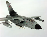 A German Air Force Panavia Tornado of JbG-32, Lechfeld, Germany, with an AIM-9 Sidewinder air-to-air missile attached to the wing and an AGM-88 HARM air-to-ground missile attached to the underside of the fuselage 
