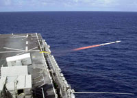 A RIM-116 Rolling Airframe Missile is launched after locking onto its target during a live fire missile exercise on board the USS BATAAN (LHD 5) (Wasp class)