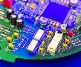 Axiom has invested in a fully automated, robotic, precision conformal coating system, providing highly accurate application of conformal coatings to printed circuit board assemblies by way of a 4 axis spray head system. 