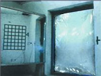 Stills from a controlled test showing the affects of a window without anti-fragmentation film